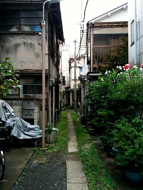 Unpaved Tokyo Alleyway