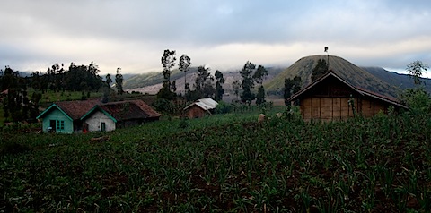 Houses in Bromo Against Volcano