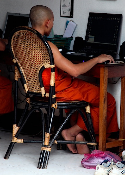 Monk Using Computer