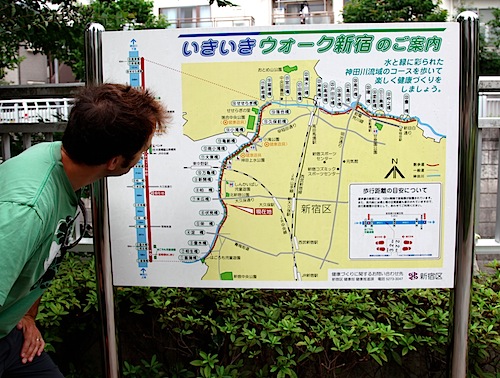 Me looking at map along Kanda river