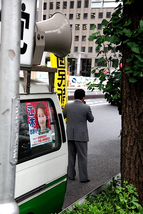 Politician canvassing in street