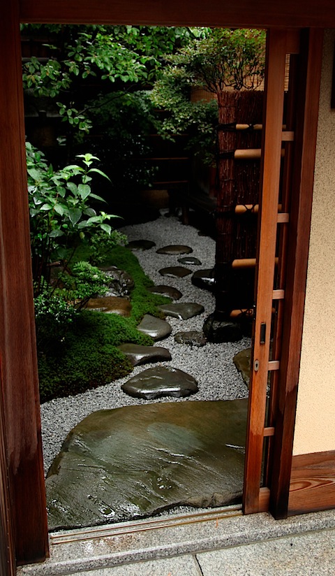 Japanese garden framed in door