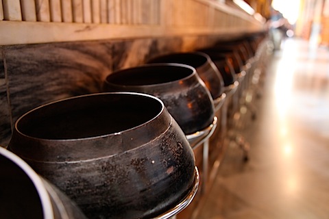 Offering bowls at Reclining Buddha