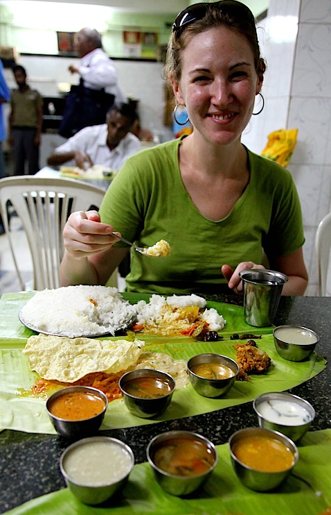 Wendy eating off banana leaf at Manorama