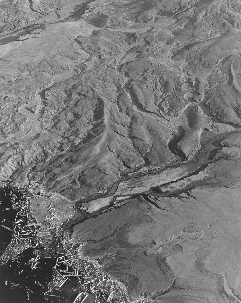 Aerial view: Landslide- Debris Flow and Edge of Spirit Lake-- 4 miles NE of Mt. St. Helens, Washington