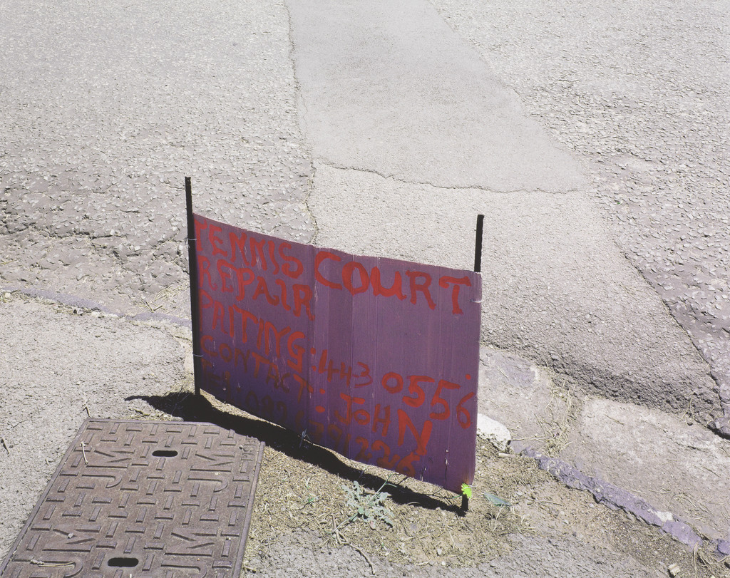 Advert, 11th Street and 11th Avenue, Lower Houghton