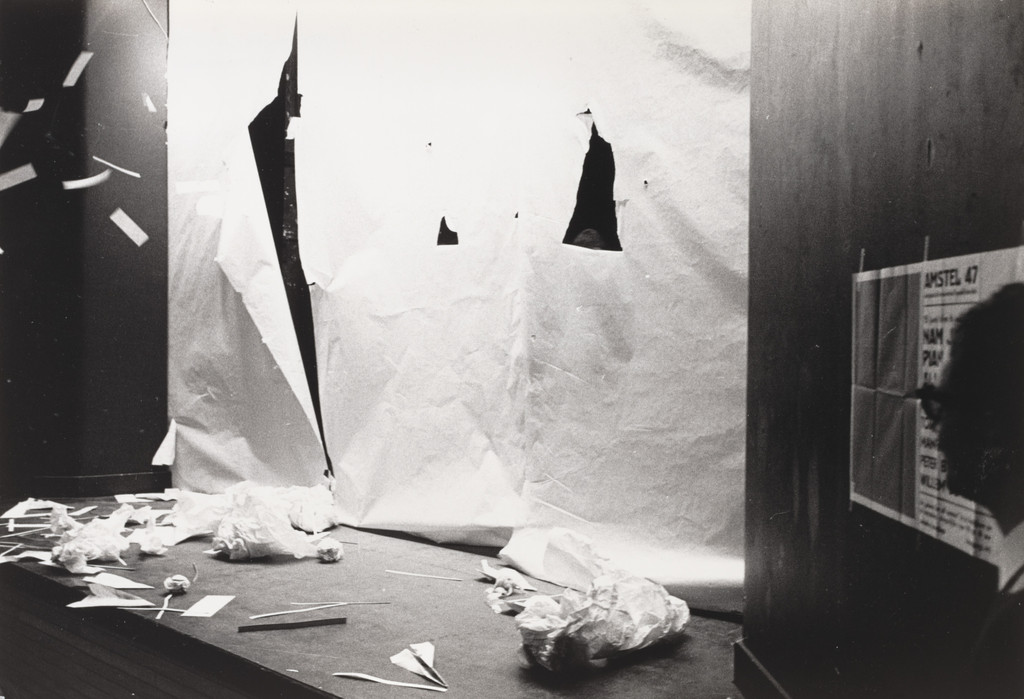 Paper Piece (1960), performed during Fluxus Festival/Theatre Compositions/Street Compositions/Exhibits/Electronic Music, Hypokriterion Theater, Amsterdam, June 23, 1963