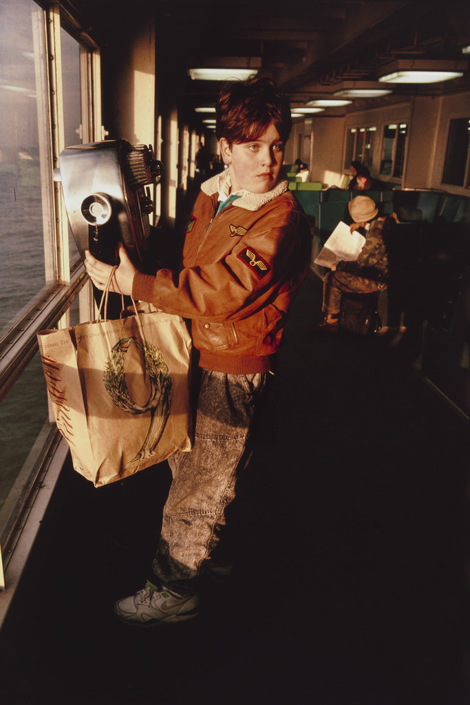 Boy looking at his mother. Staten Island Ferry. New York harbor from the series Fish Story