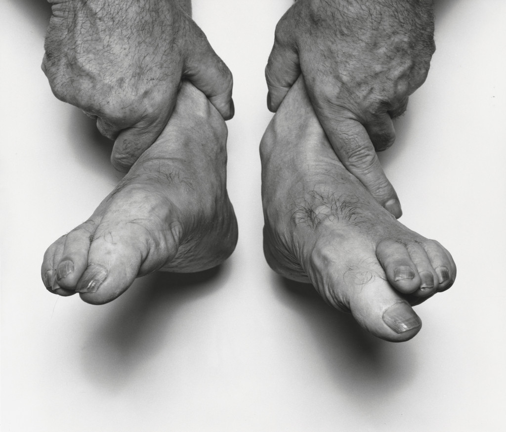 Hands Holding Feet