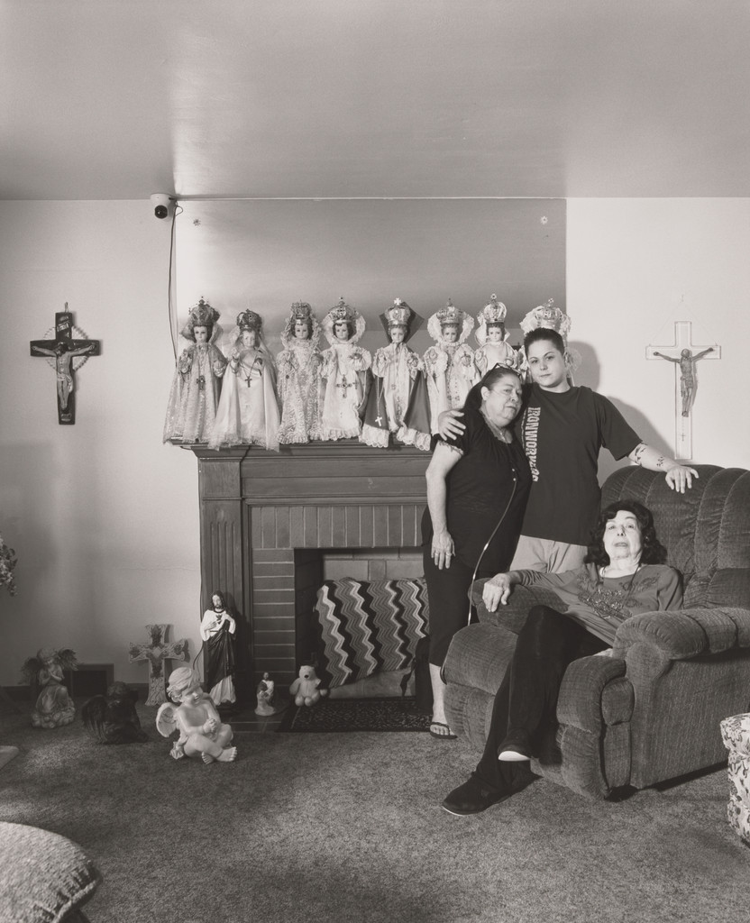 Mindy Miller, Iron Workers Union Local 851, standing in her grandmother’s living room with her mother and grandmother, Lezlie and Marlene Miller, [11 years in at Auto Warehouse Company (AWC)], Niles, OH