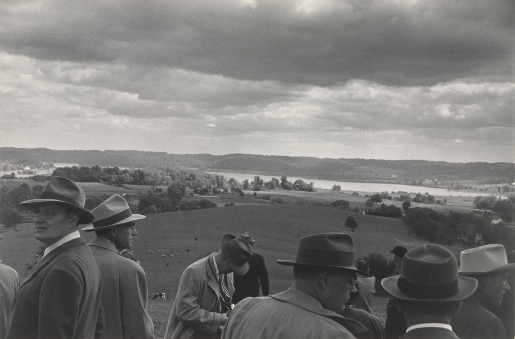 Businessmen Assess an Unidentified Site for Development