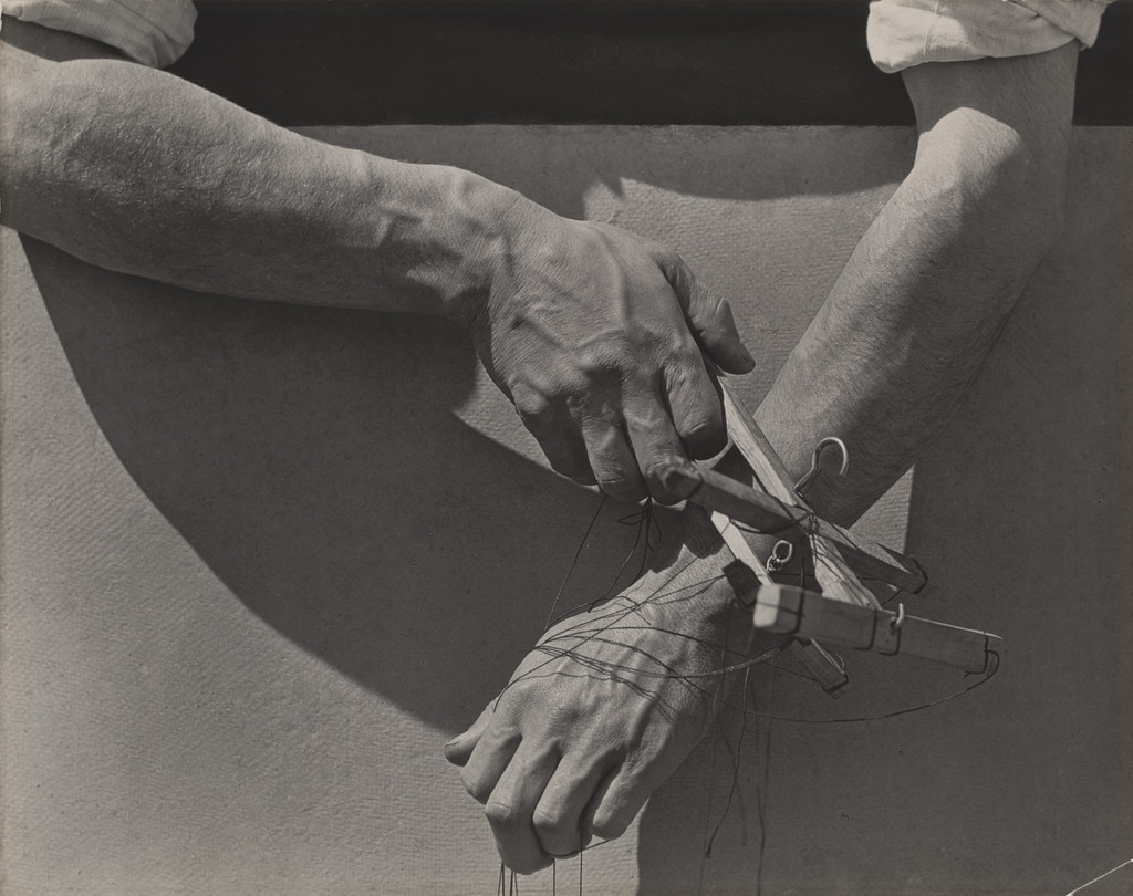 Hands of Marionette Player