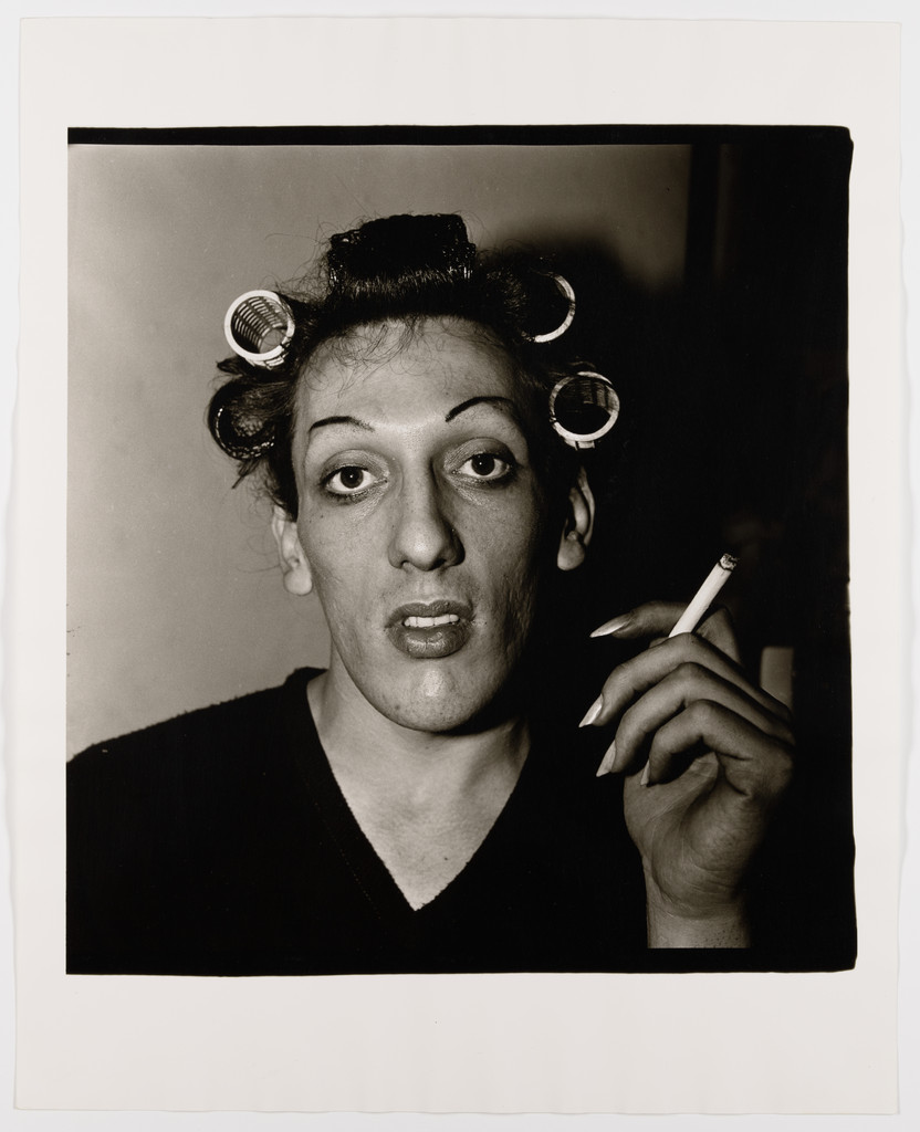 A young man in curlers at home on West 20th Street, N.Y.C.