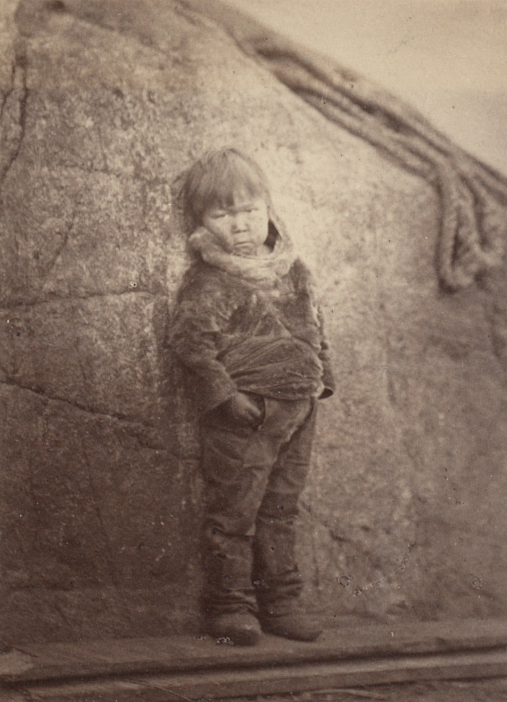"An Esquimaux pet, a boy about eight years old"