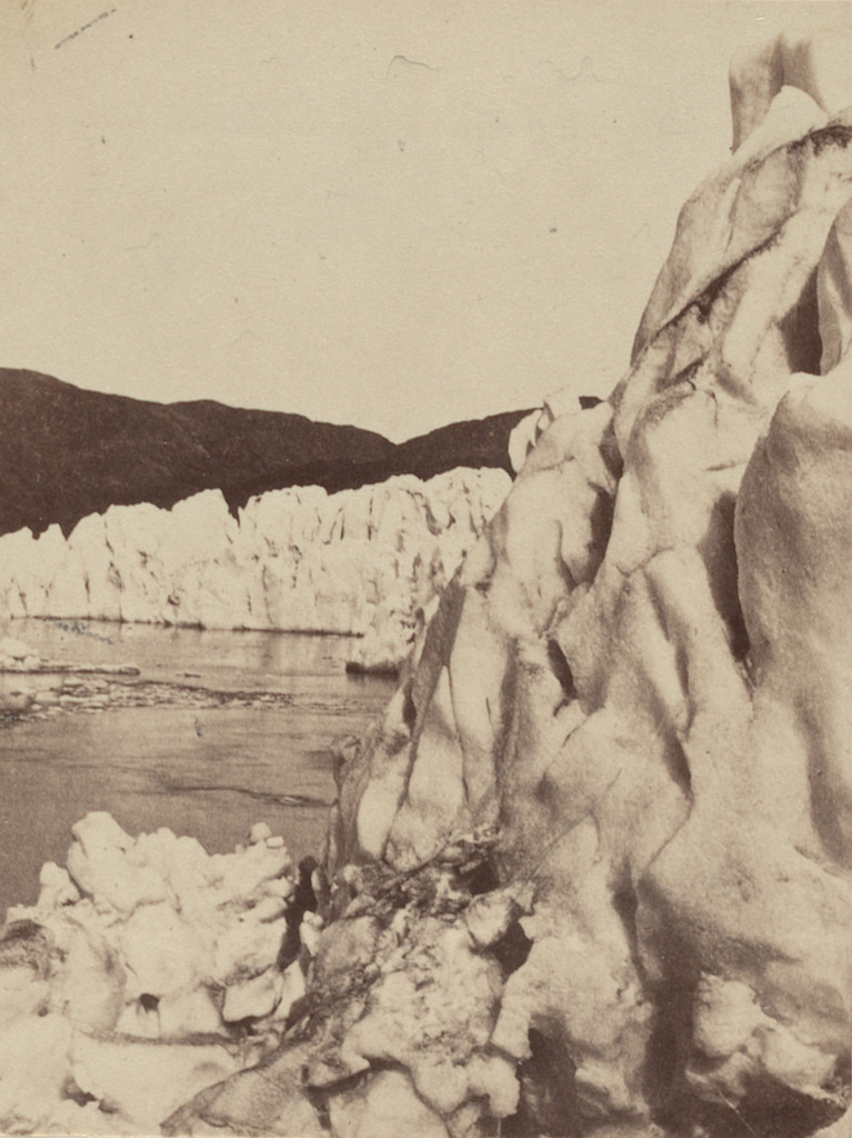 "Side view of the glacier, where the middle is forced out more rapidly than the sides."