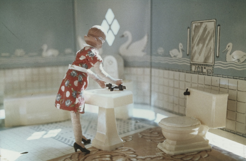 1st Bathroom/Woman Standing, from the series Interiors