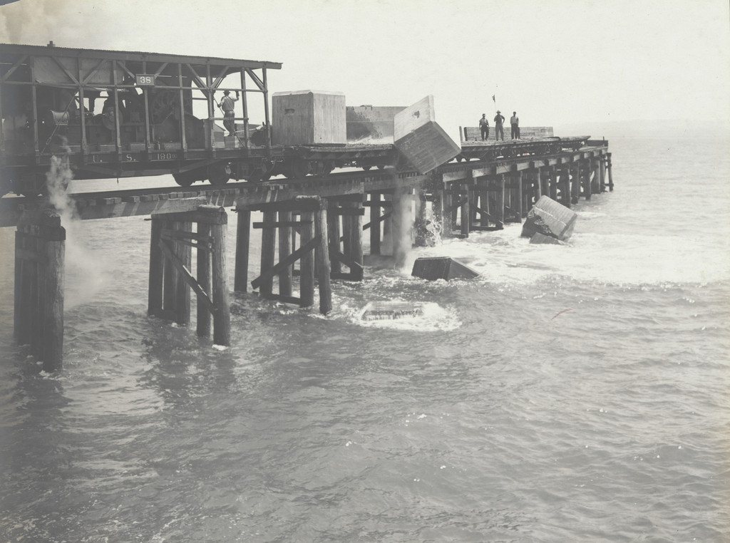 East Breakwater -- Limon Bay. Plowing 25 ton concrete blocks