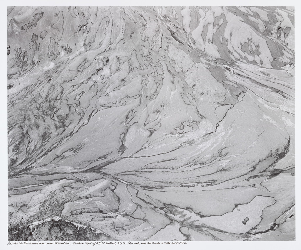 Aerial view: ash-covered snow, snow-covered ash. East flank of Mount St. Helens